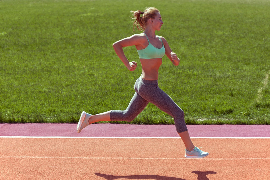 Runner racing on an athletics track