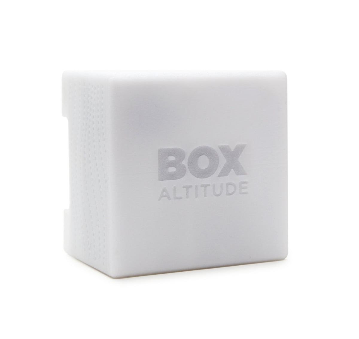 Box Altitude Sensor, a small white cube with an embossed logo and a perforated vent on one side
